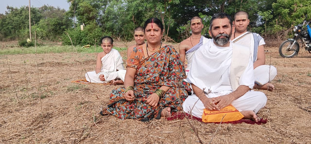Founder at the Vedapathashala Land with family and students